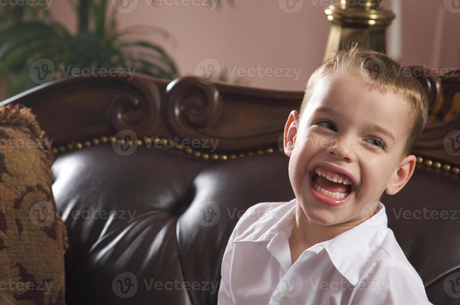 Adorable Young Boy Smiles photo