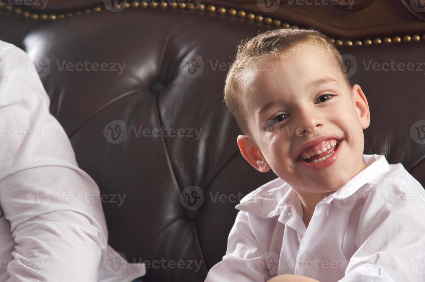 Adorable Young Boy Smiles photo