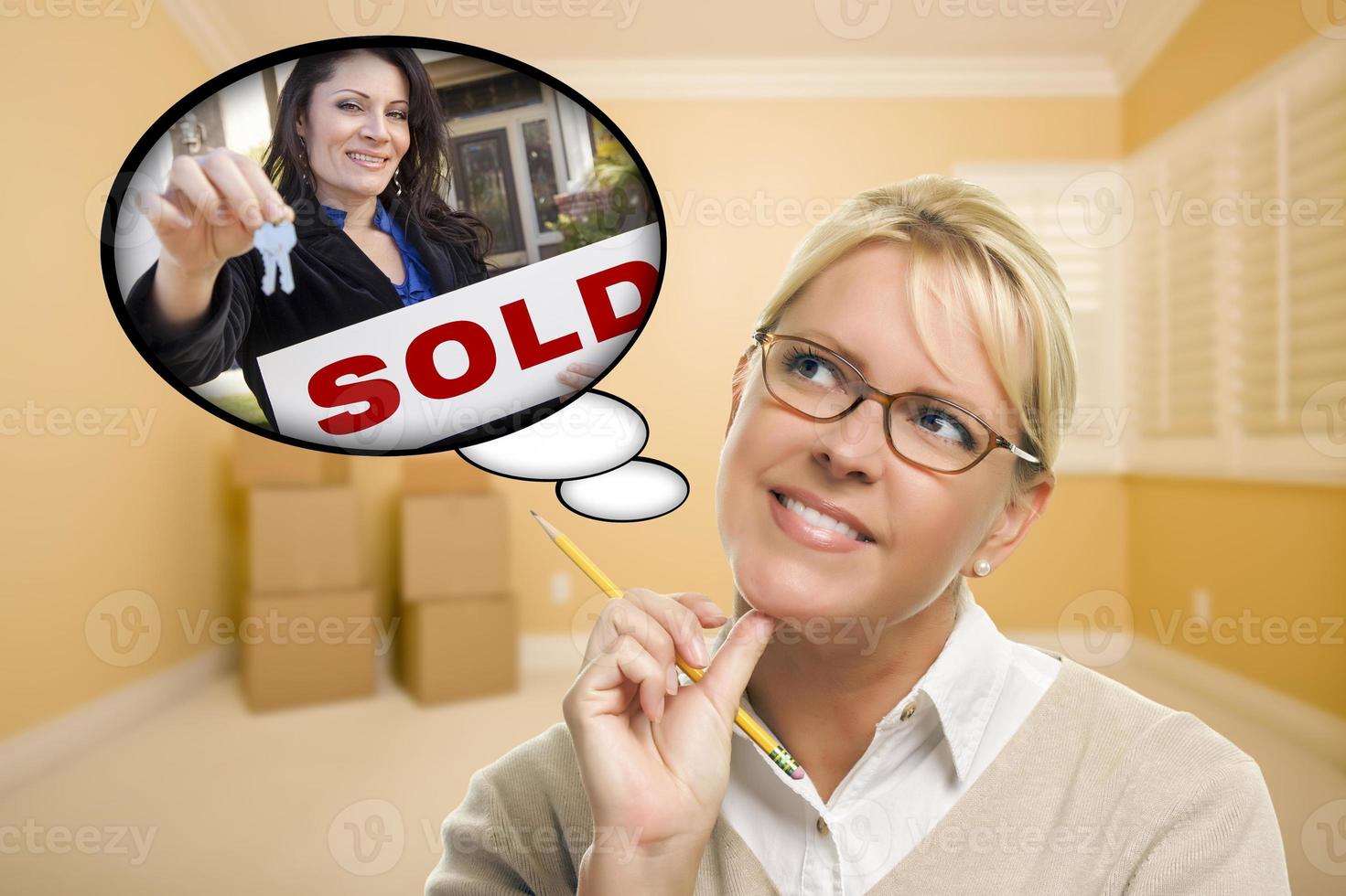 Woman In Empty Room with Thought Bubble of Agent Handing Over New Keys photo