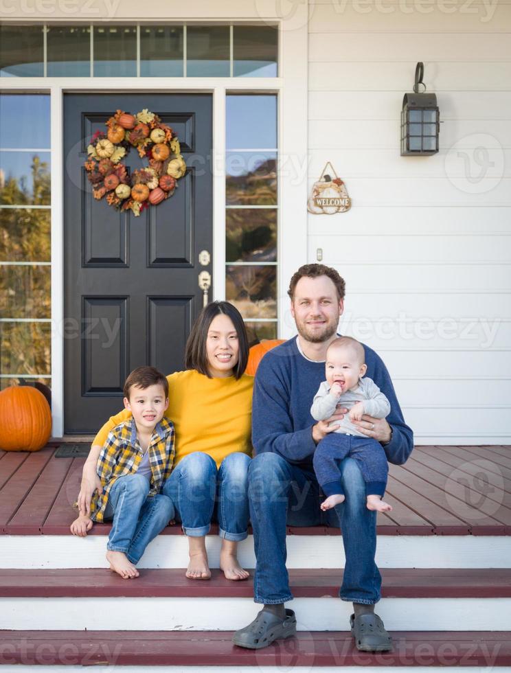 Young Mixed Race Chinese and Caucasian Family Portrait photo