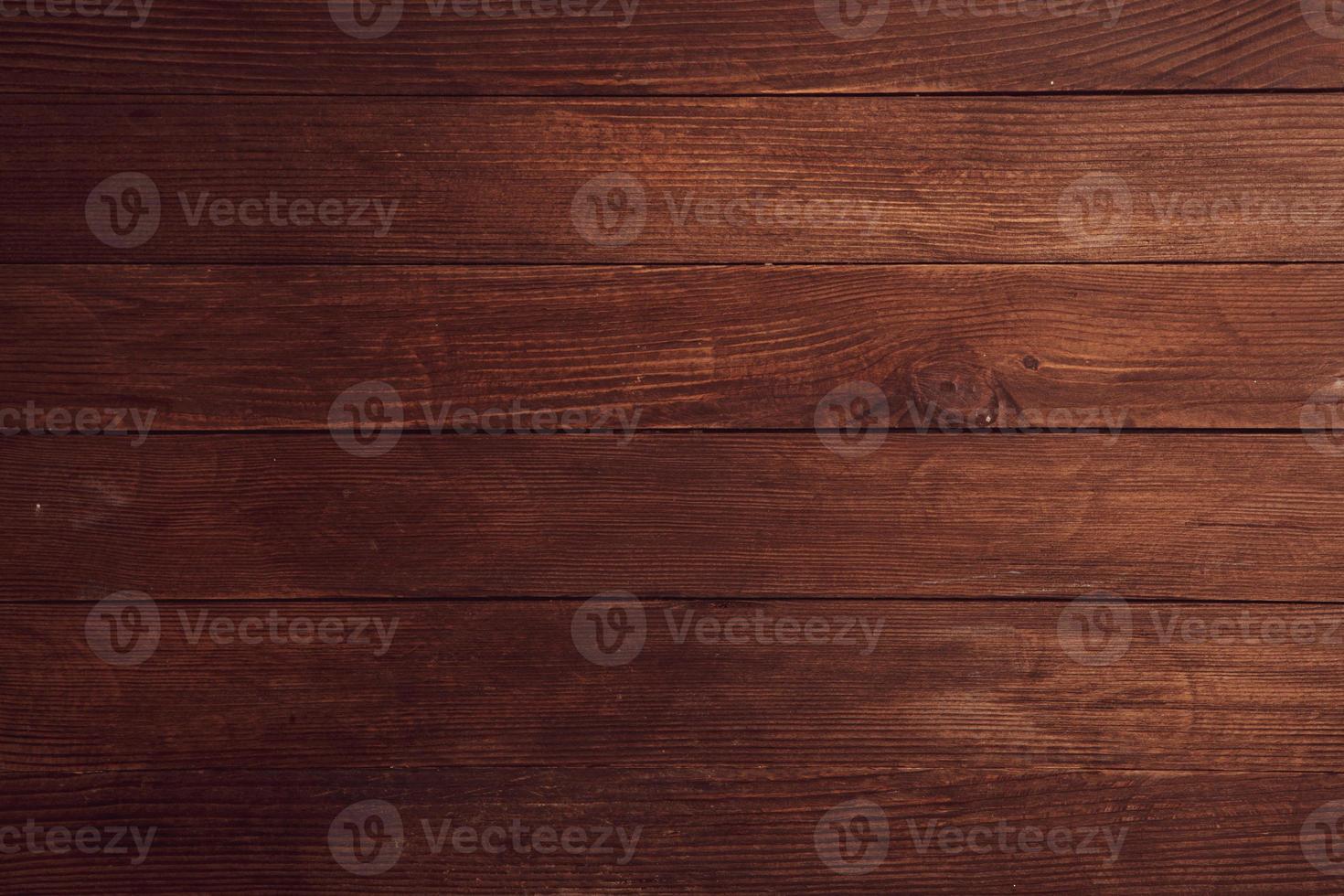 Vintage brown wood background texture with knots and nail holes. Old painted wood wall. Brown abstract background. Vintage wooden dark horizontal boards. photo