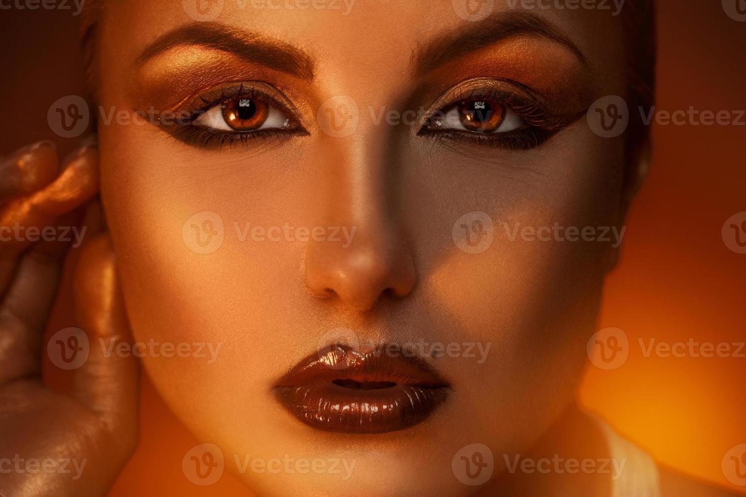 Close up portrait of pretty caucasian woman with brown eyes photo