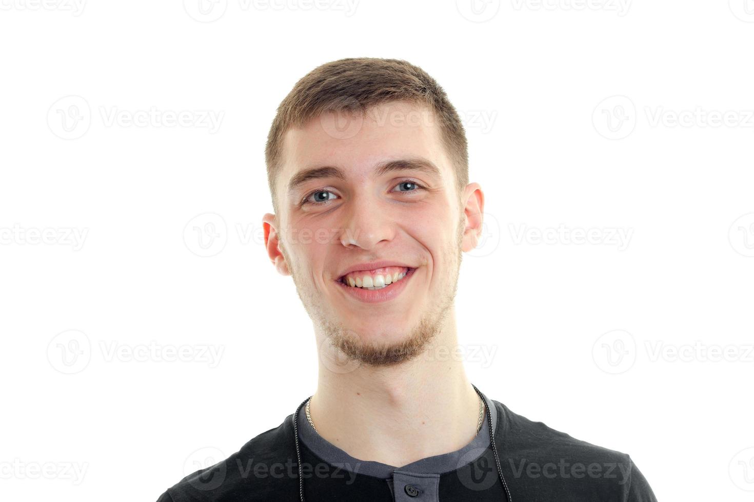 close up portrait of happy young man with smile photo