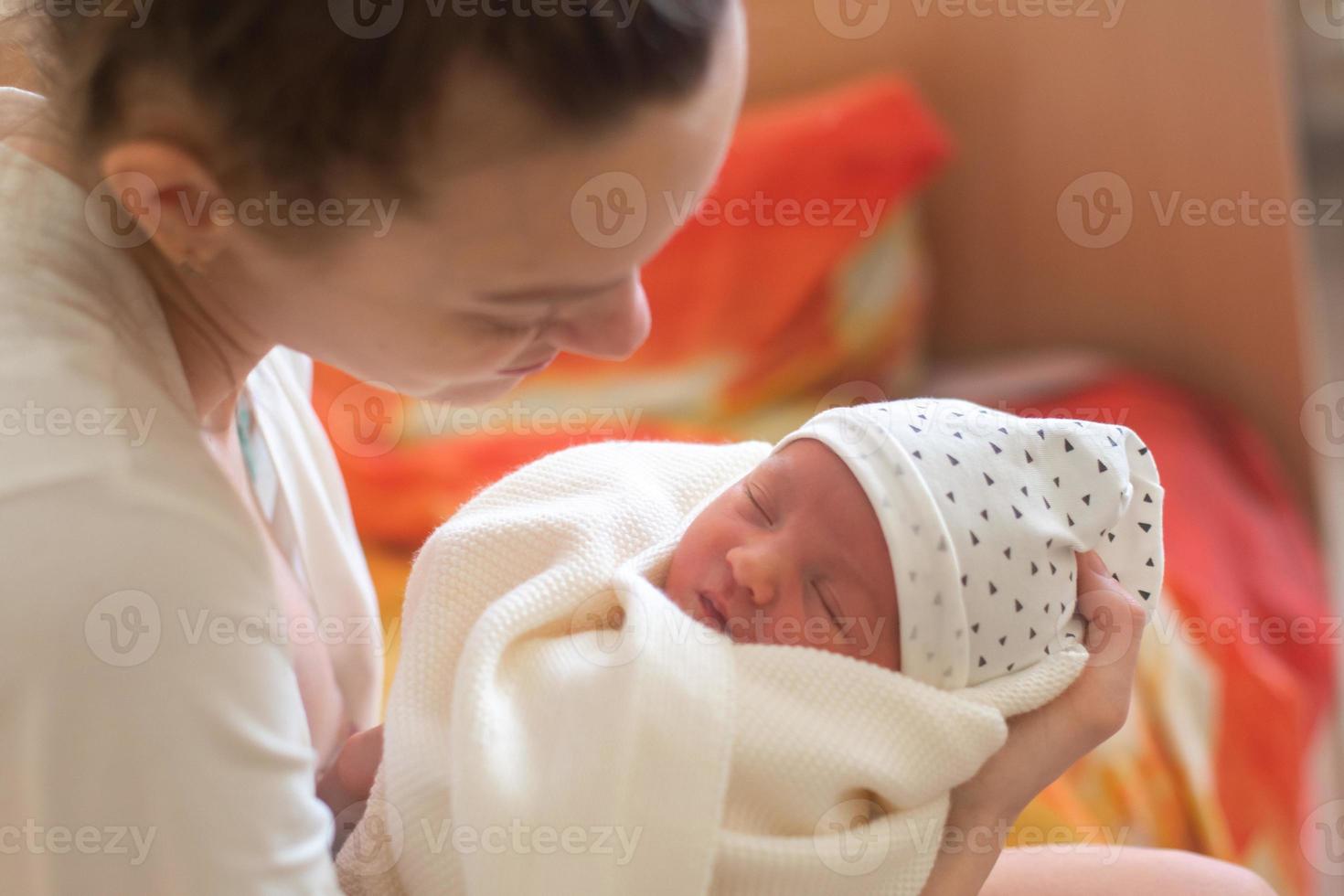 Mom and Her Little Newborn Girl photo
