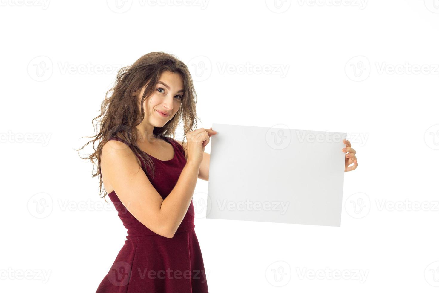 girl in red dress with white placard photo