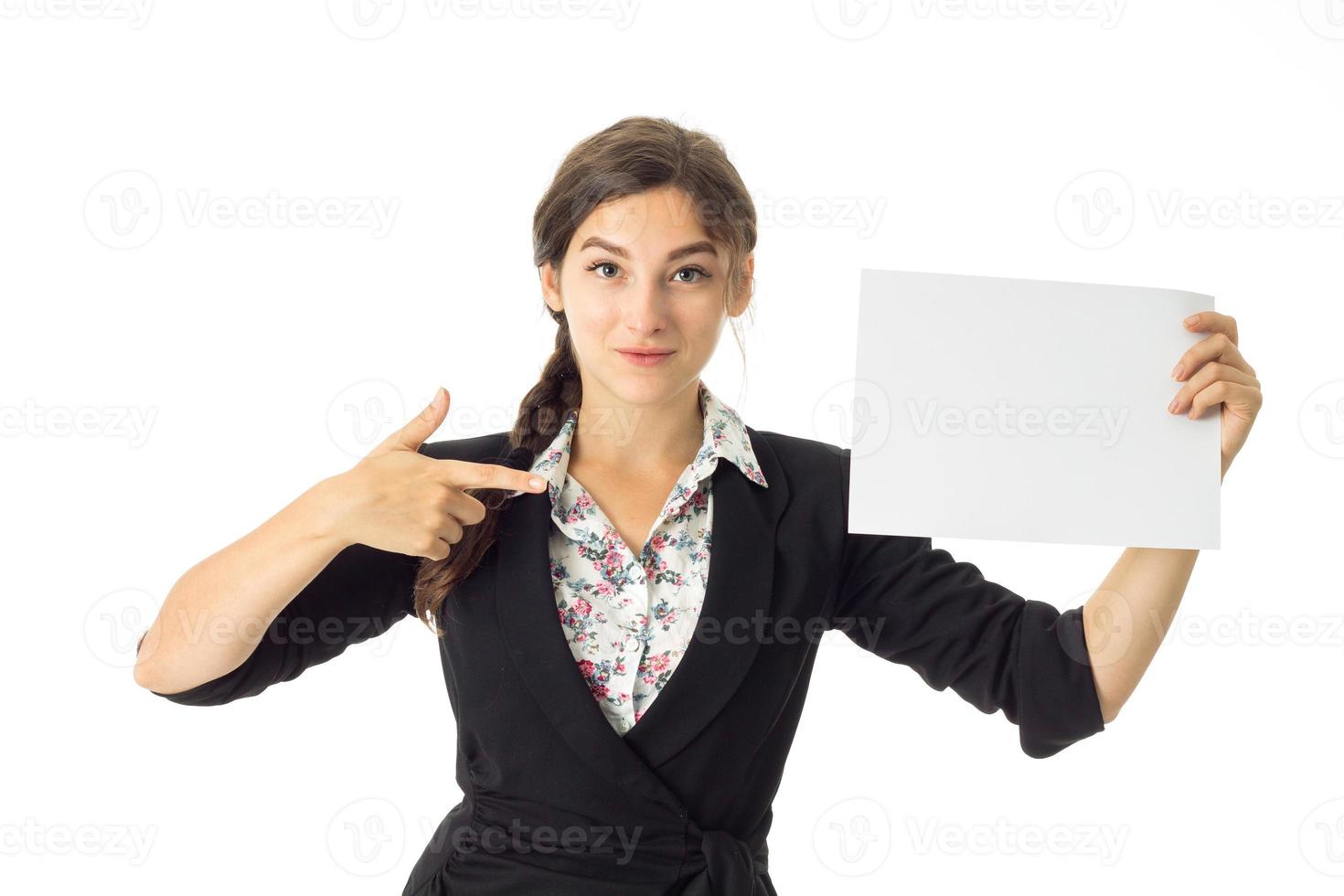 woman in uniform with white placard in hands photo