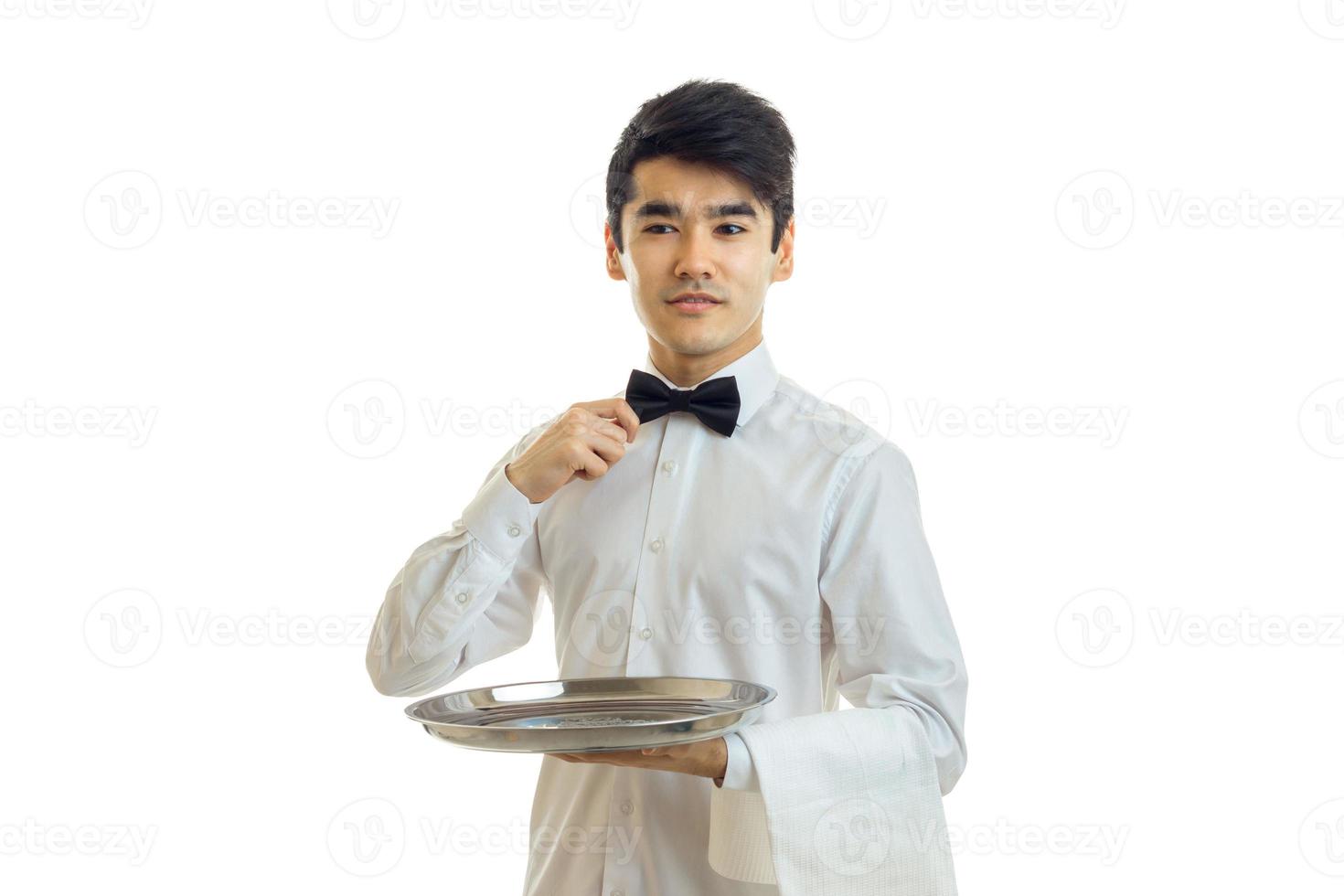 very cute waiter holding a blank tray photo