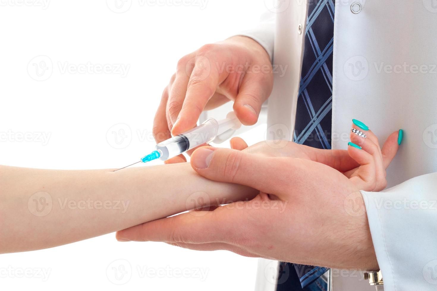 young doctor does prick filler girl close-up photo