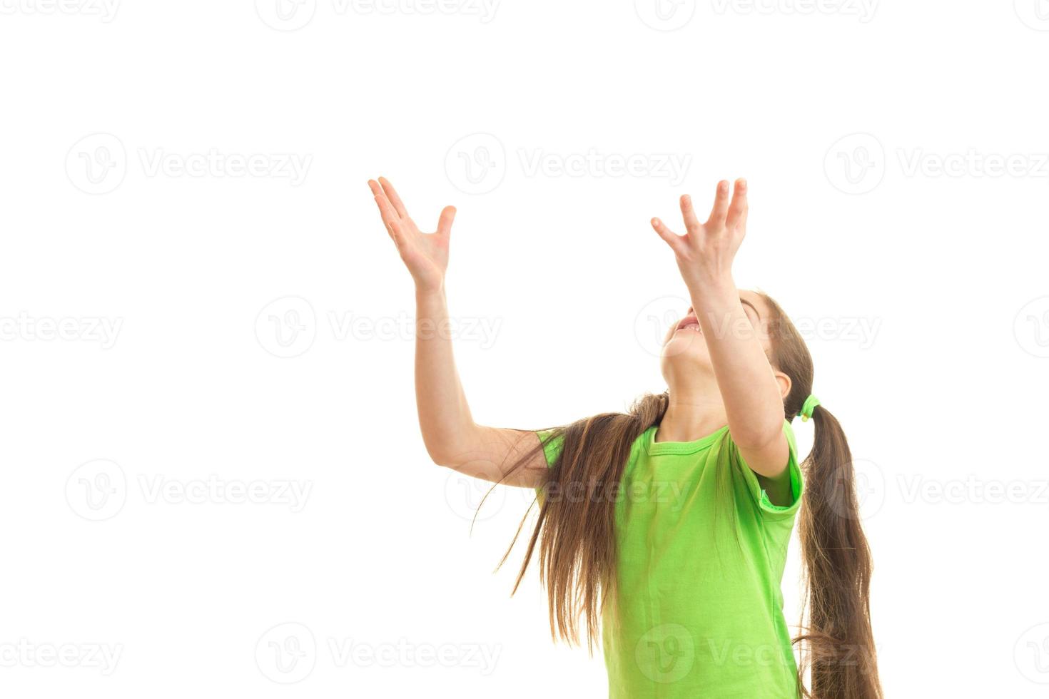 little girl something catches in hands photo