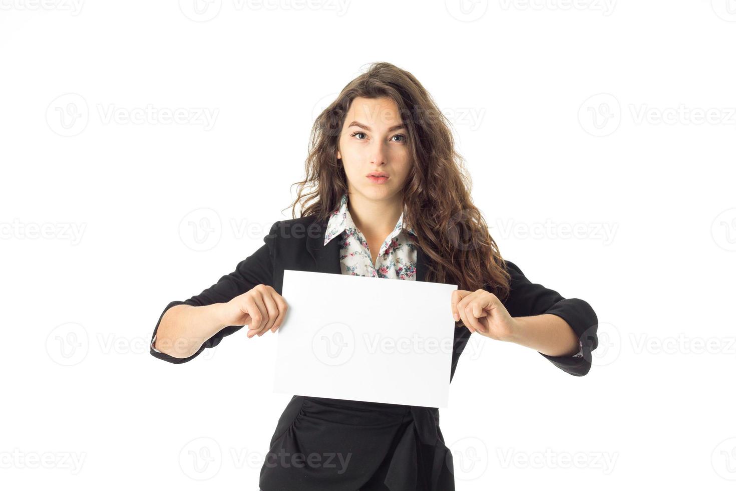 woman in uniform with white placard in hands photo