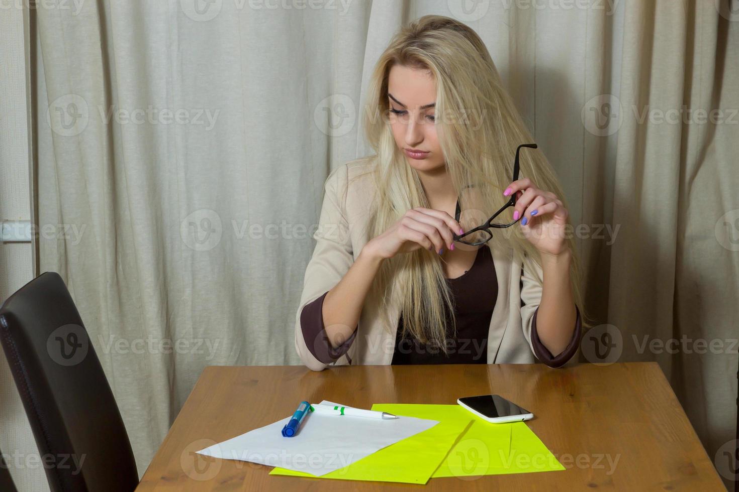 Blonde girl in the office photo