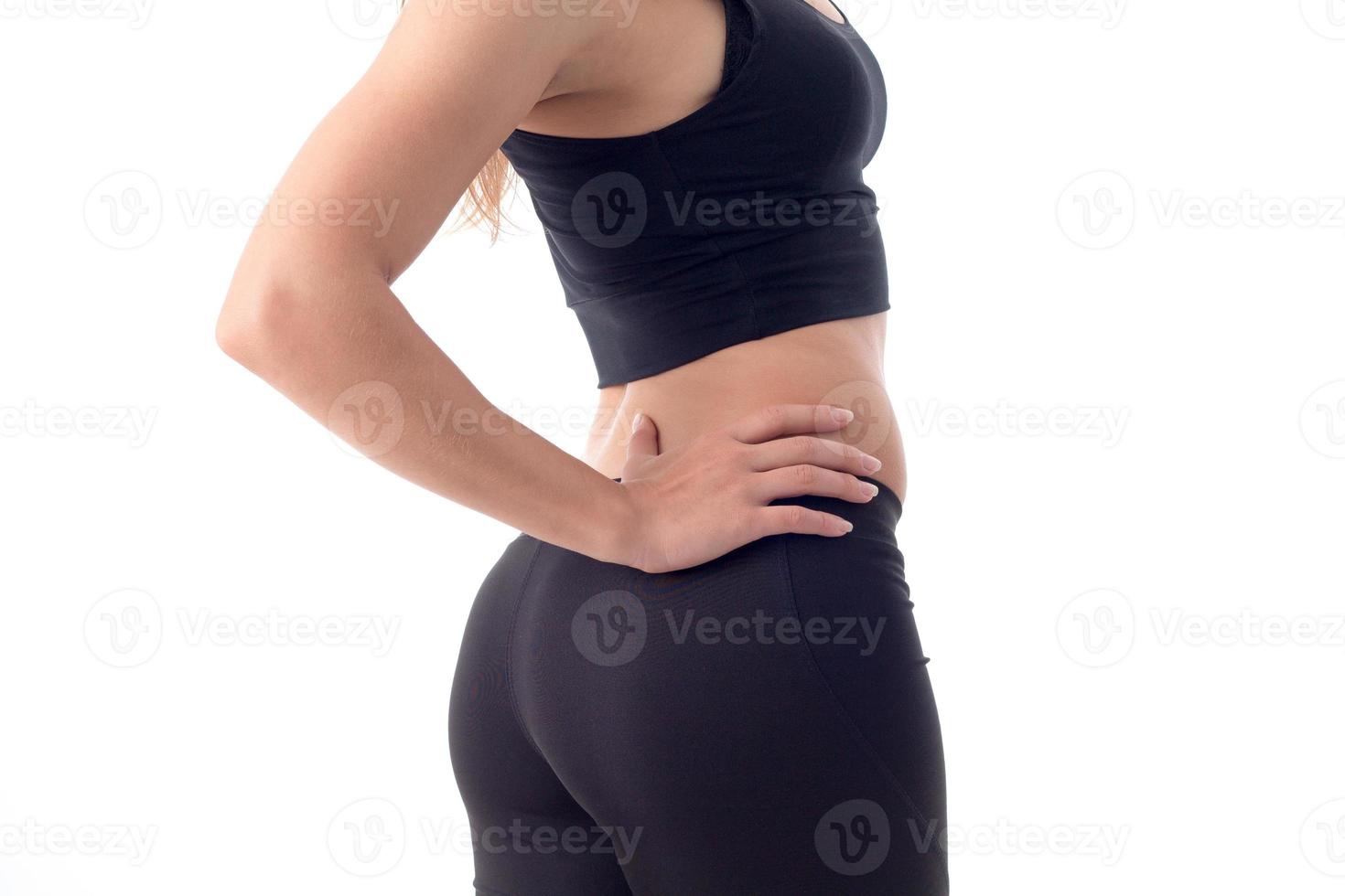 girl worth turned sideways and keeps a hand on the hip photo
