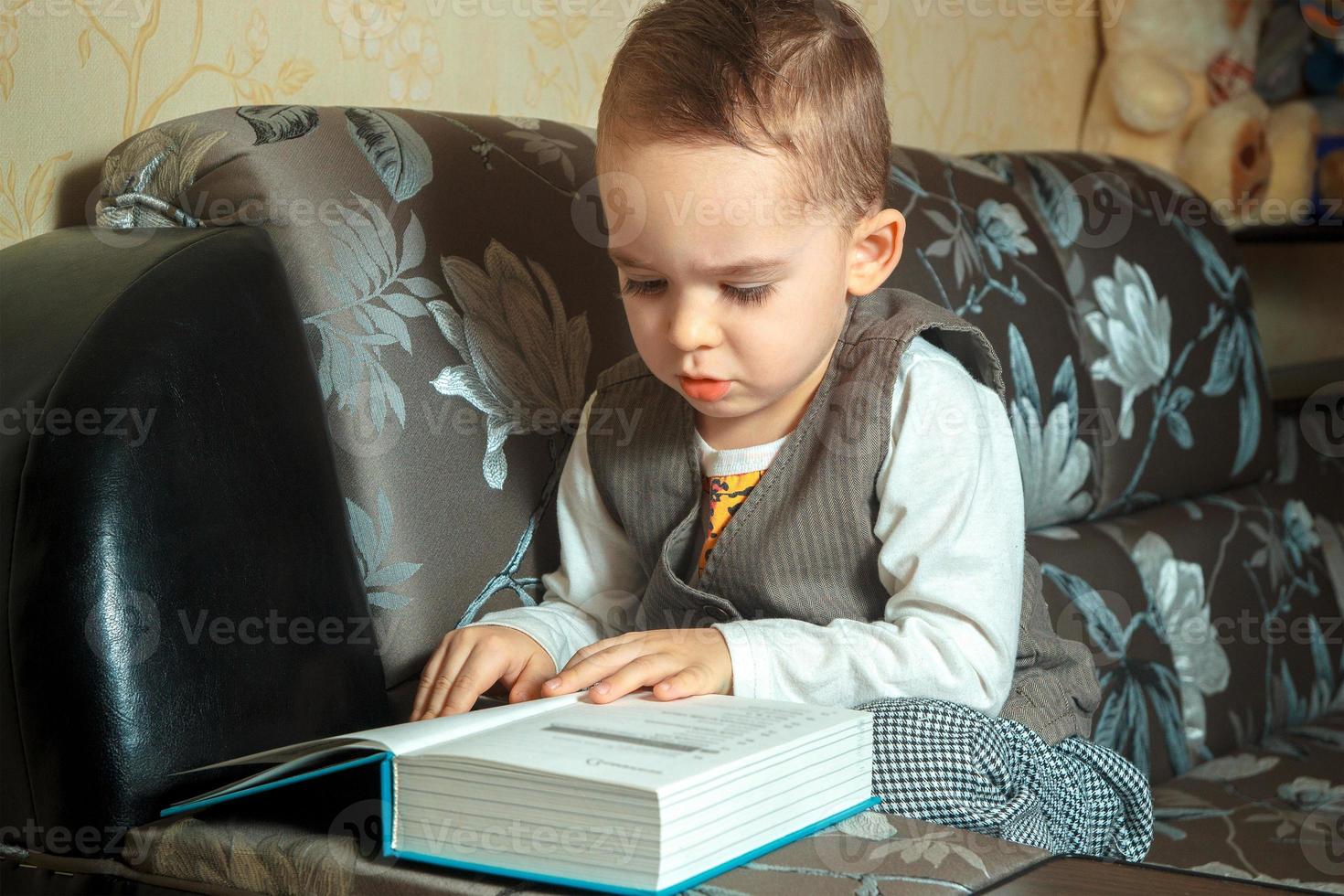 cutie young boy in elegant suit photo