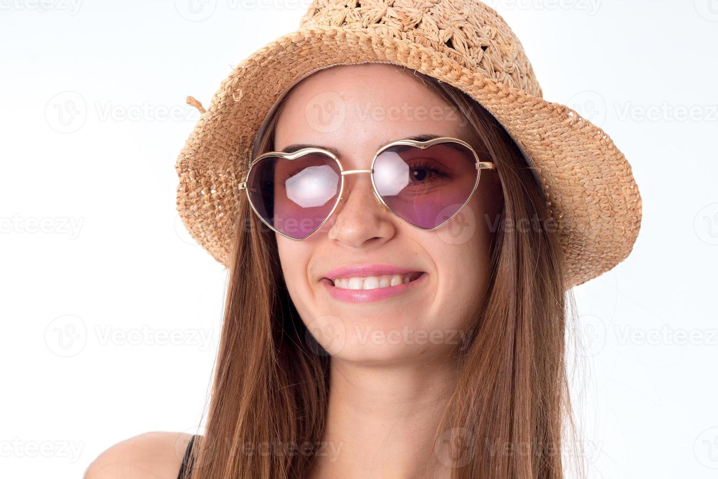 chica con gafas de sol y paja foto