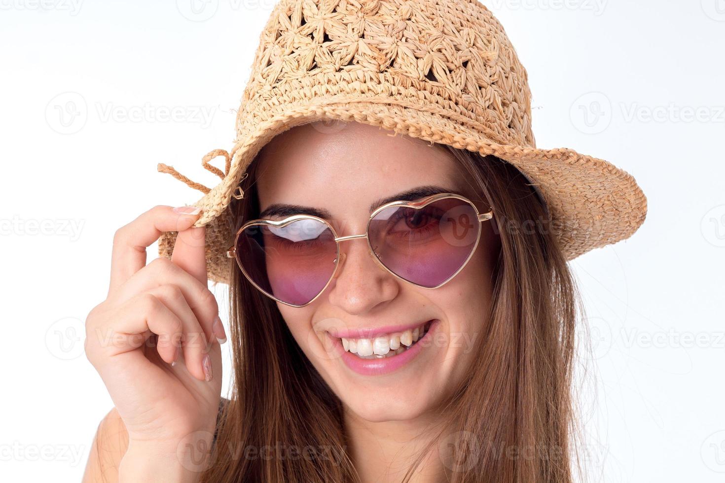 girl in sunglasses and straw photo