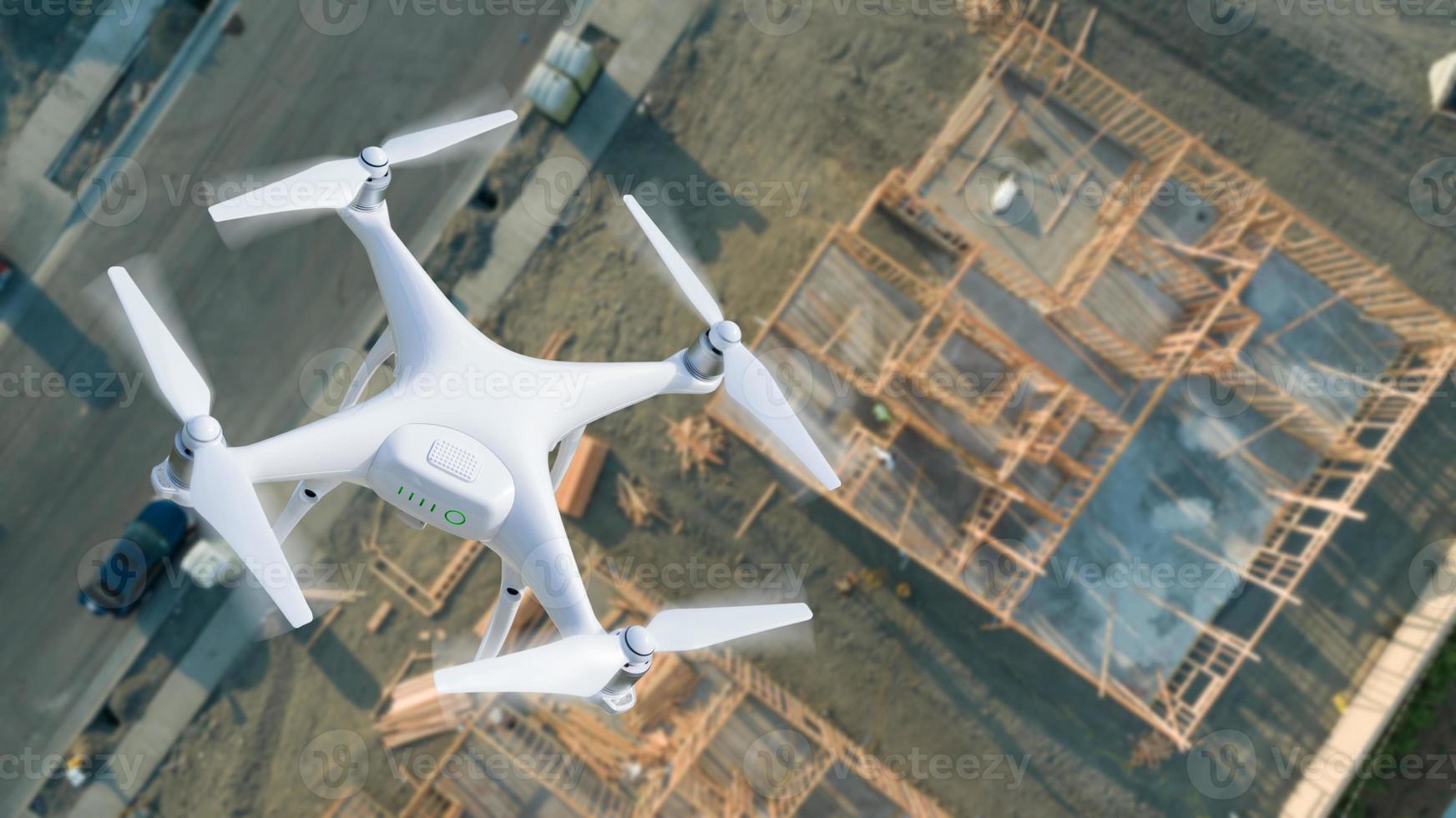 Unmanned Aircraft System UAV Quadcopter Drone In The Air Over Construction Site. photo