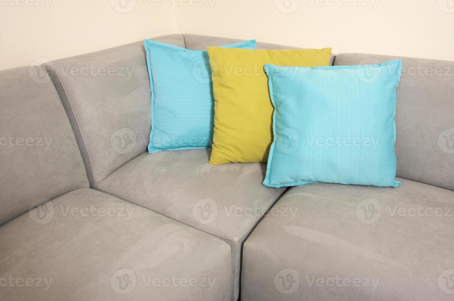 Grey Suede Couch and Pillows photo