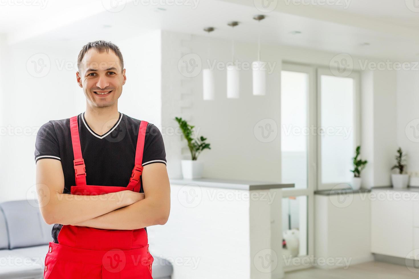 Construction worker installing photo