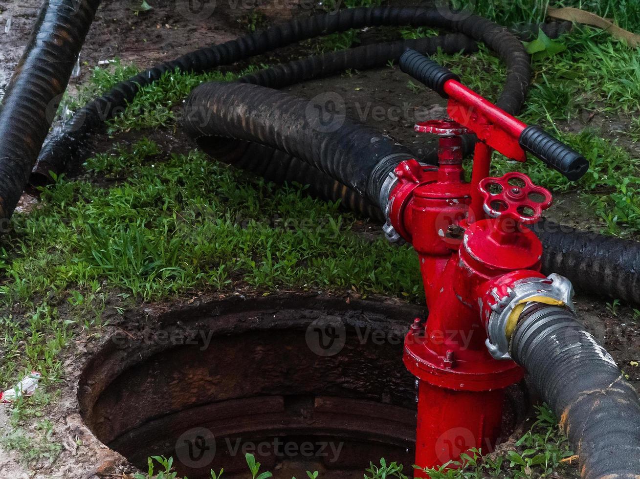 Fire Hydrant In Use During a Structure Fire photo