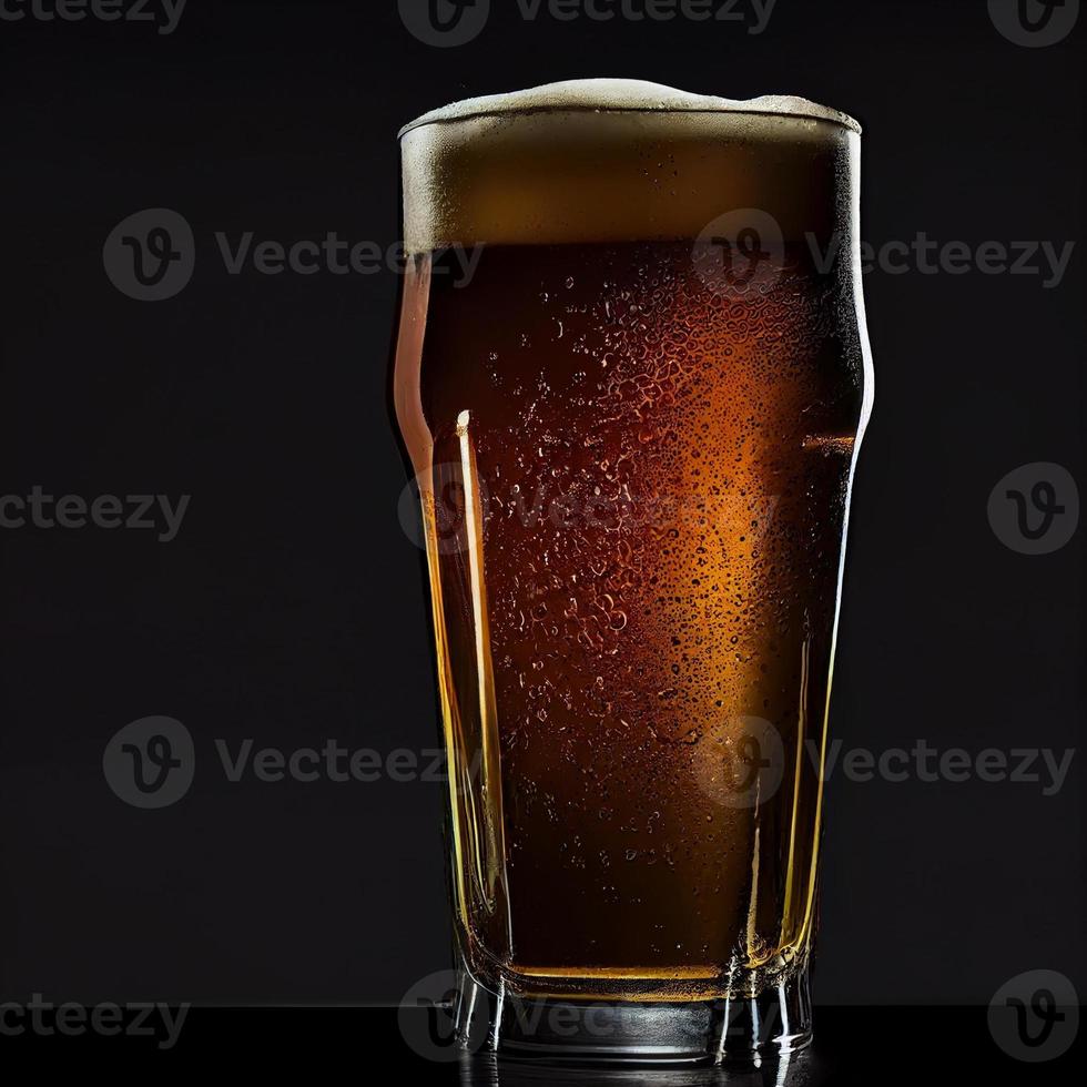 a glass of beer on black background photo