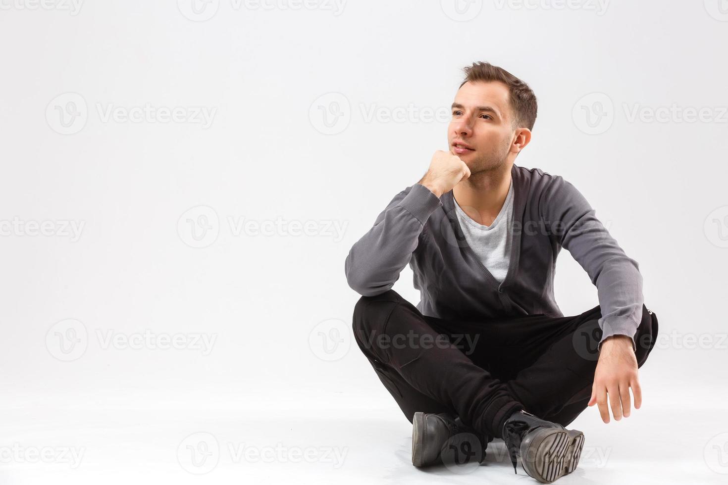 man thinking over gray background photo