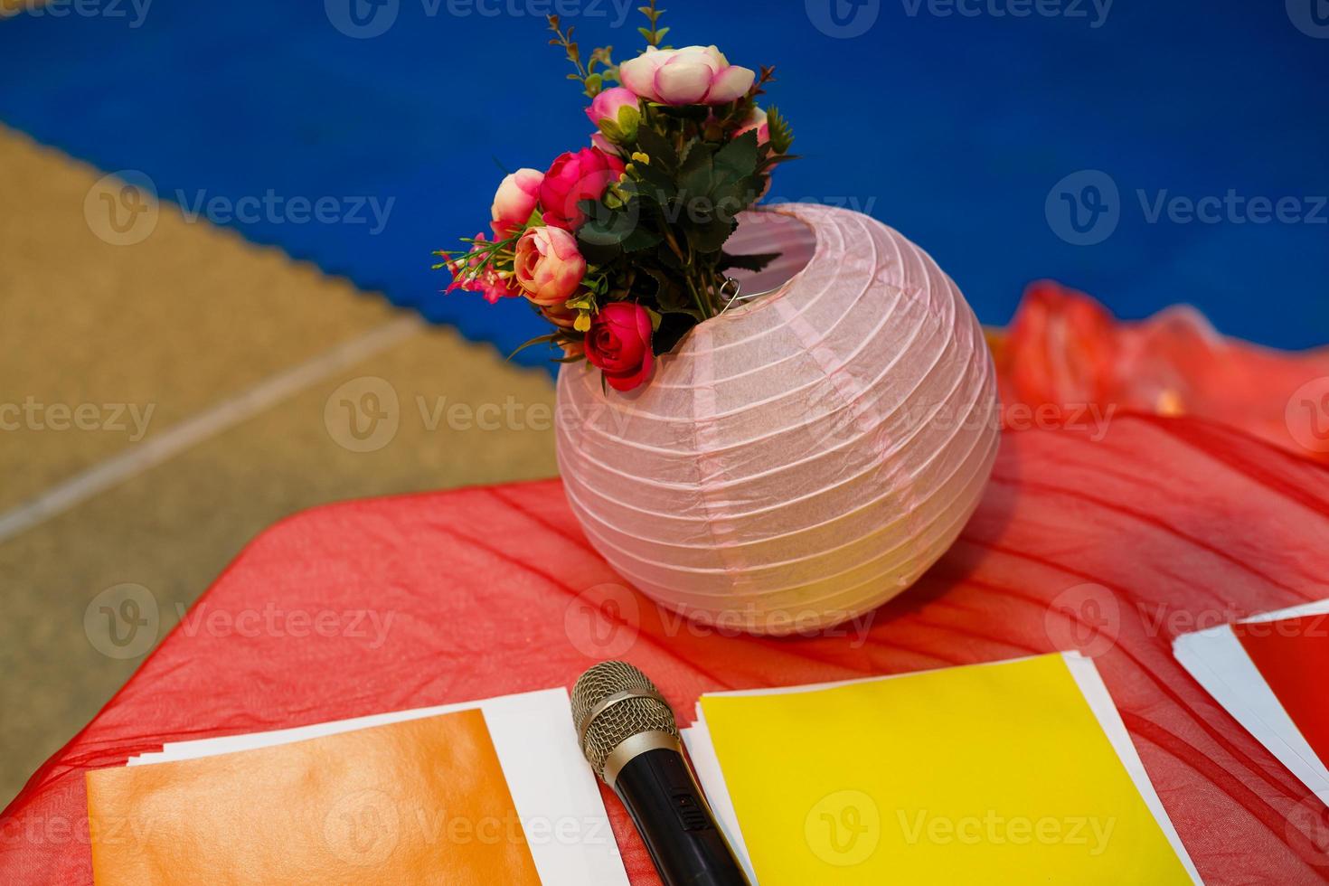 Flower vase and microphone at a wedding photo