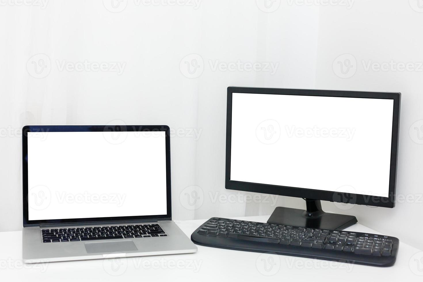 Laptops, tablets and mobile phones. Mock up image of electronic gadgets isolated on white background photo