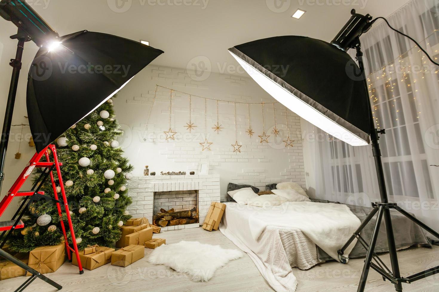 Classic Interior room decorated in Christmas style with Christmas tree and gifts photo