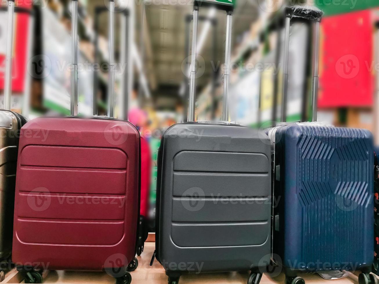 Suitcases in the shop window. Luggage bags in the store. Sale of suitcases for trips photo