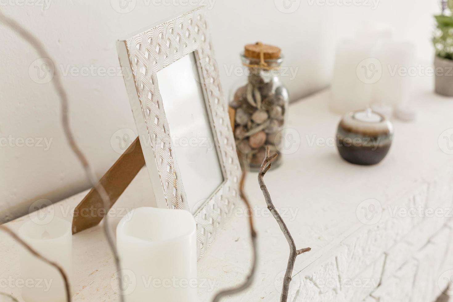 photo frame stands on a mantelpiece