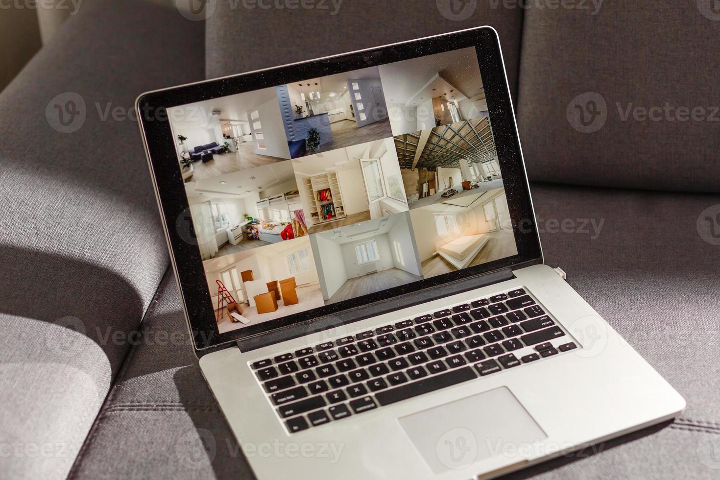 choosing hotel online, using travel application or booking service on laptop to find best place to stay on business trip, checking room reservation availability on website, close up rear view photo