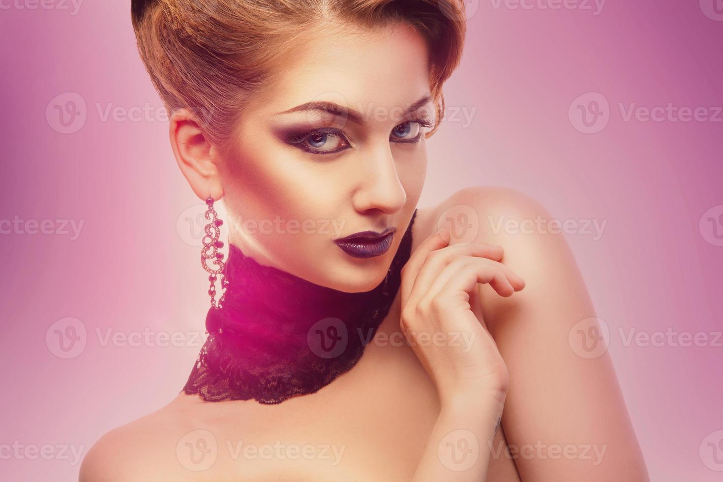 Horizontal portrait of fashion model with make up on white background photo