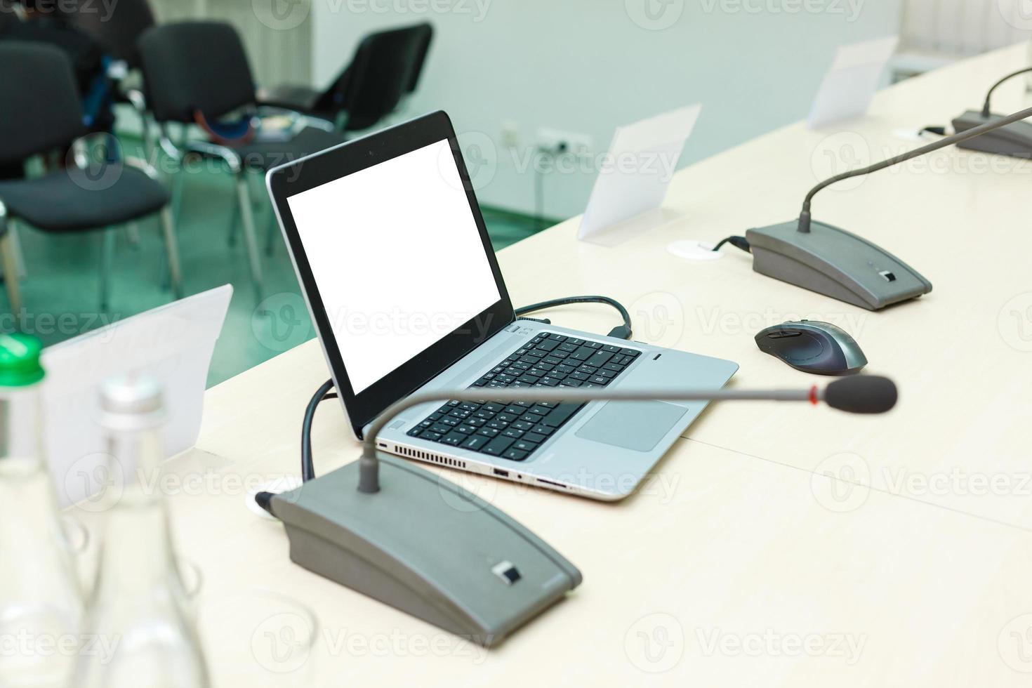 Laptop with blank screen on table. photo