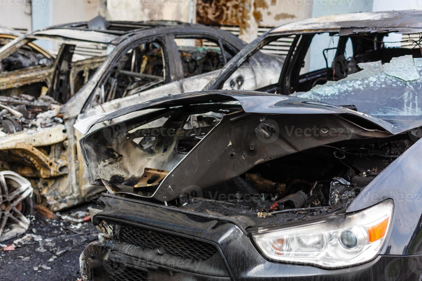 Body of the burnt car in the street photo