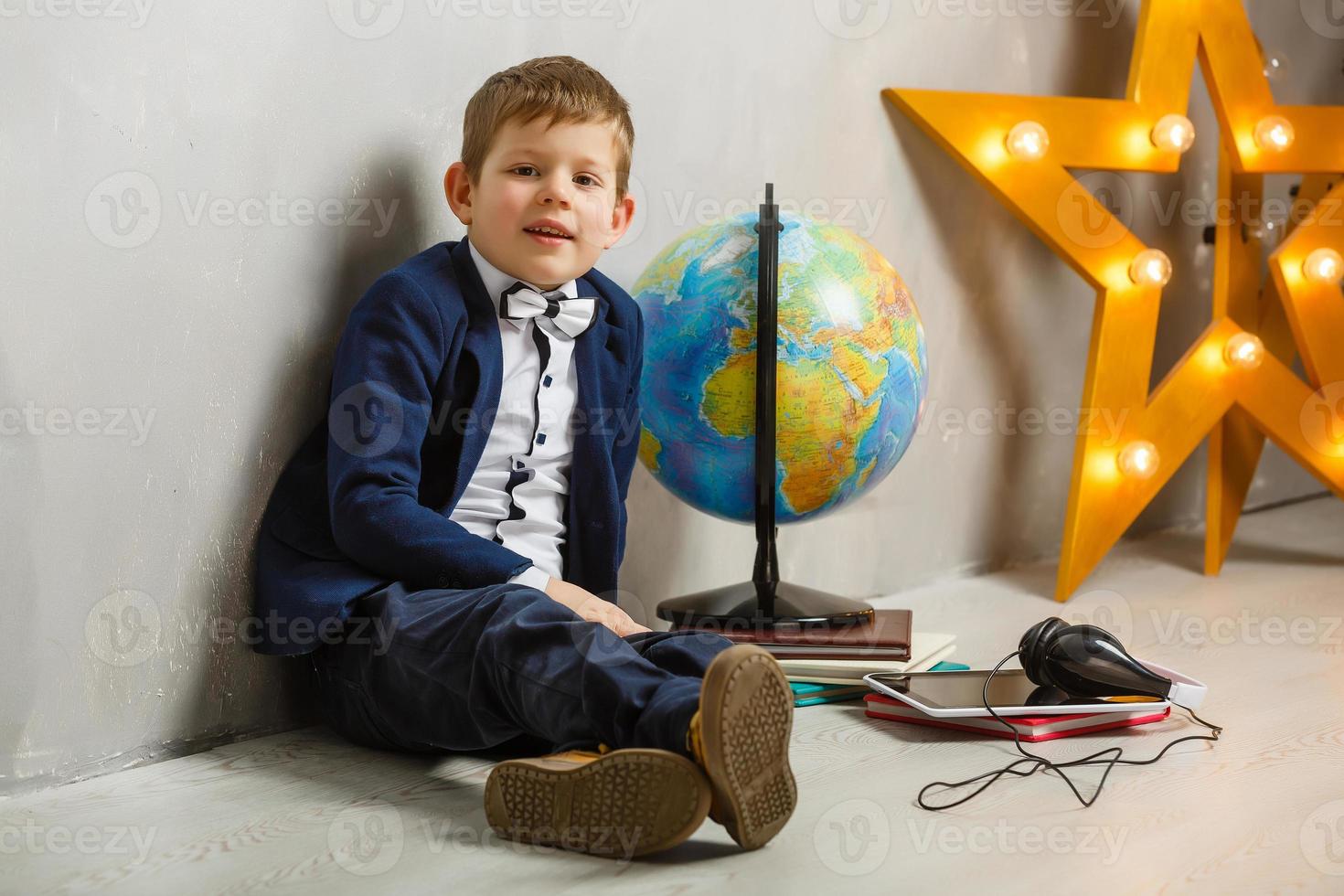 Excited boy going to school photo