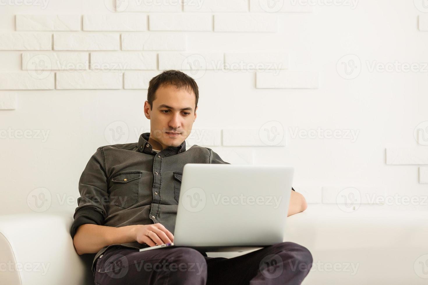 Businessman analyzing investment charts with laptop. Accounting photo