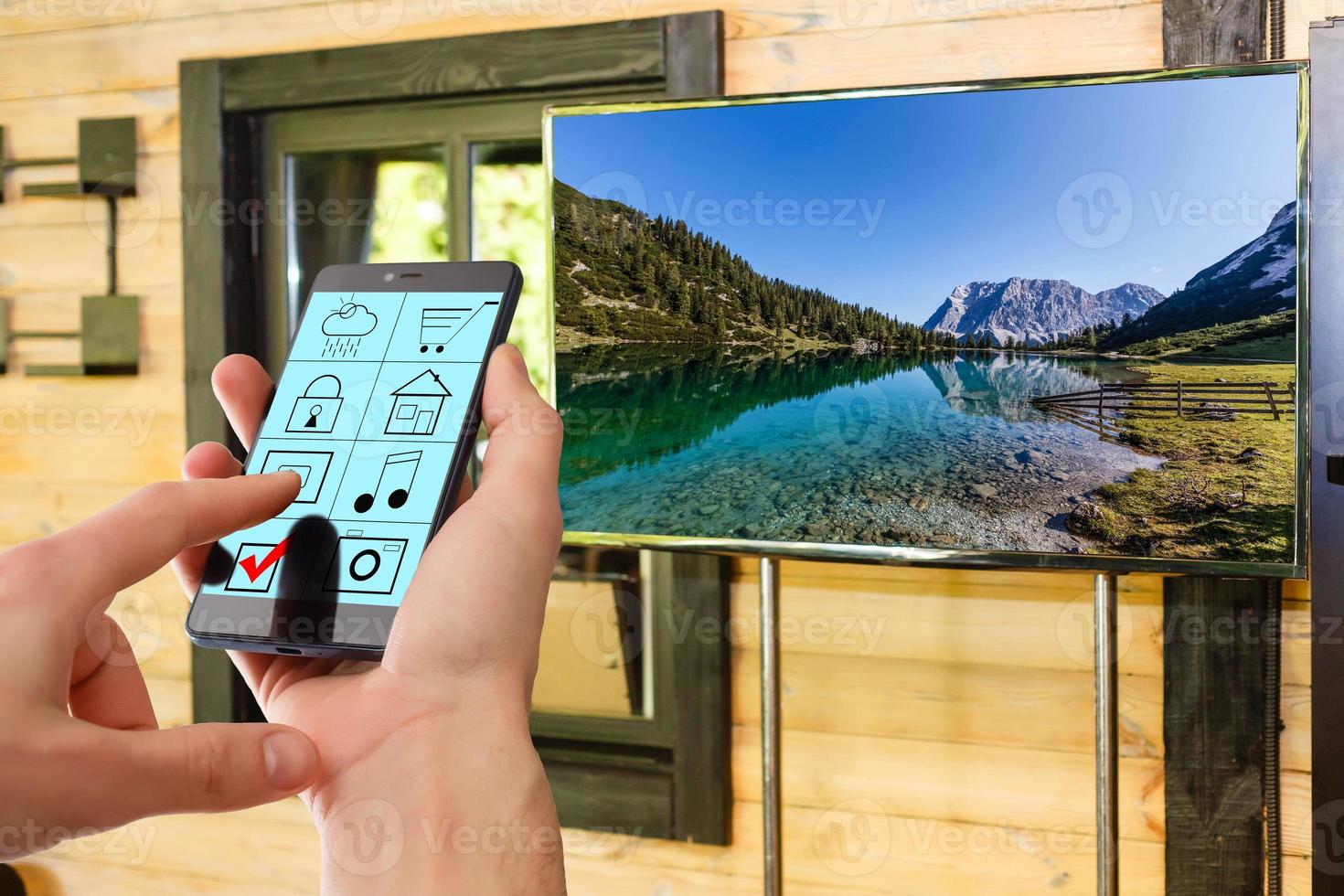 Widescreen high definition TV screen with video gallery. Remote photo