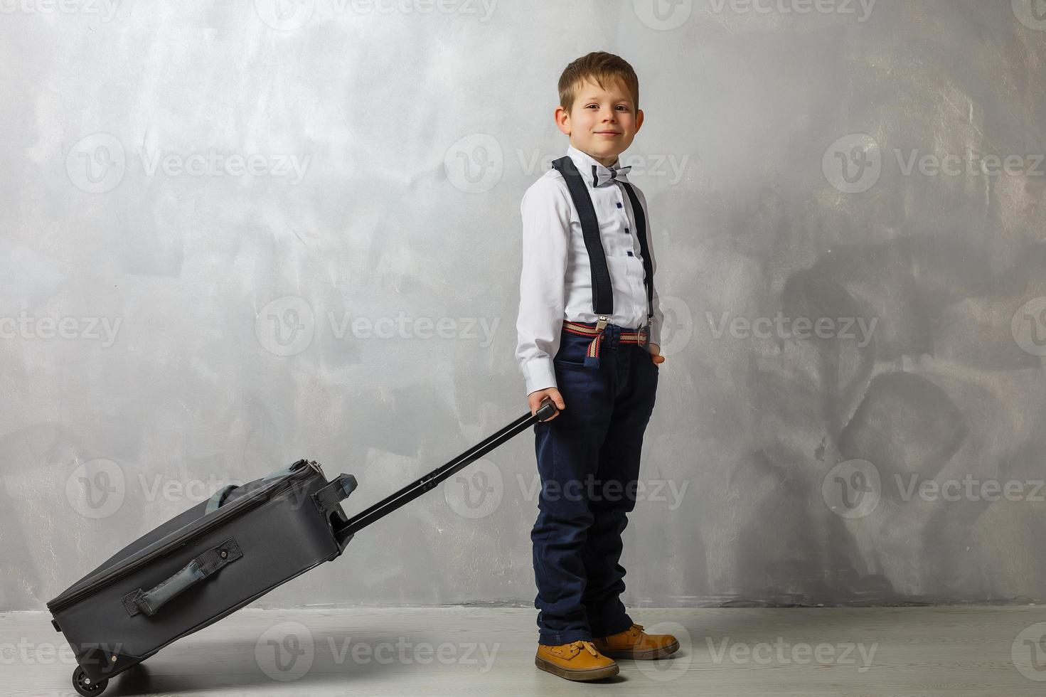 teenager with a suitcase. Isolation photo