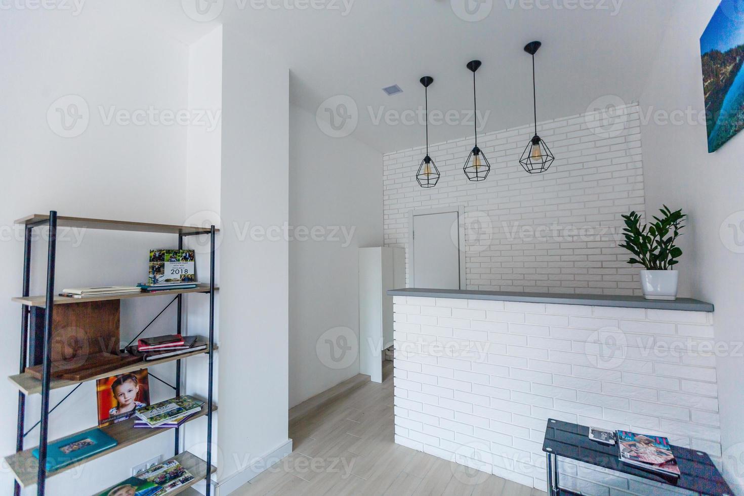 Reception desk in small medical clinic, horizontal. photo