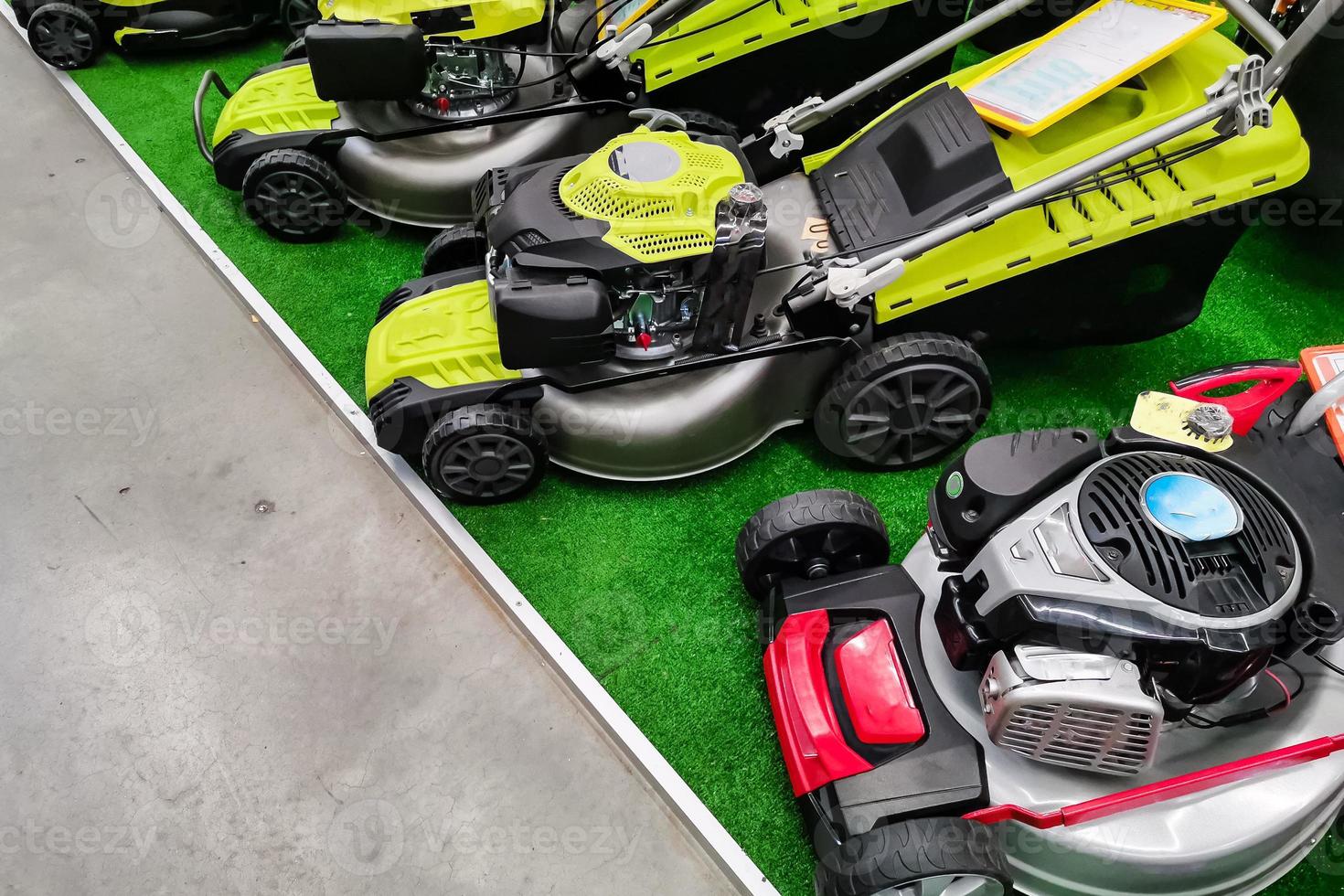 best lawnmower from assortment in garden equipment shop photo