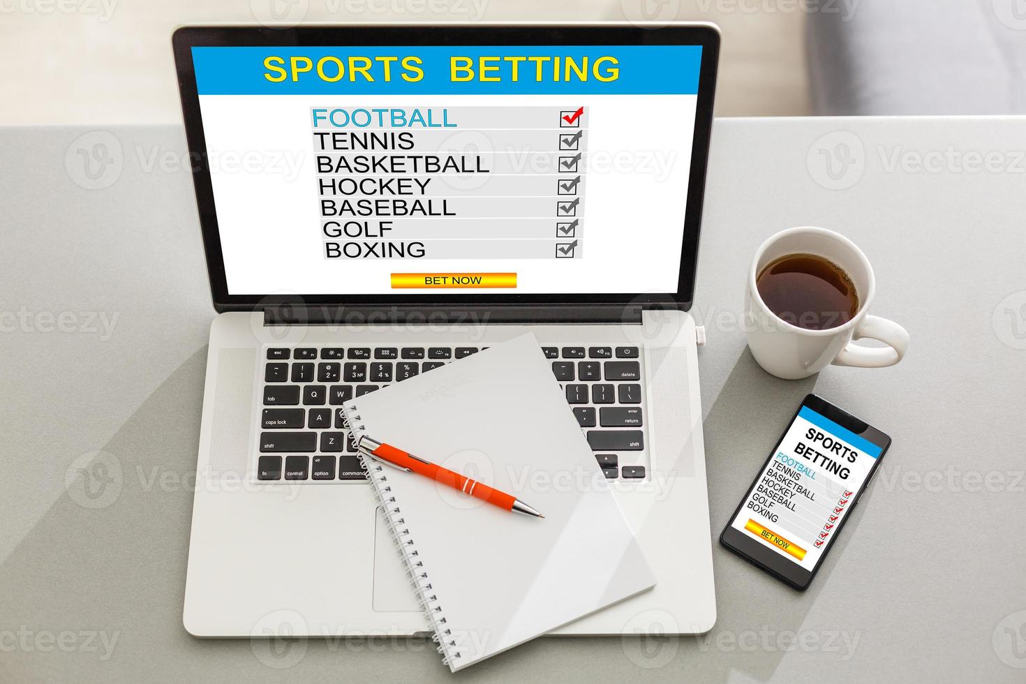 Sports betting concept on laptop, tablet and smartphone screen over gray table photo