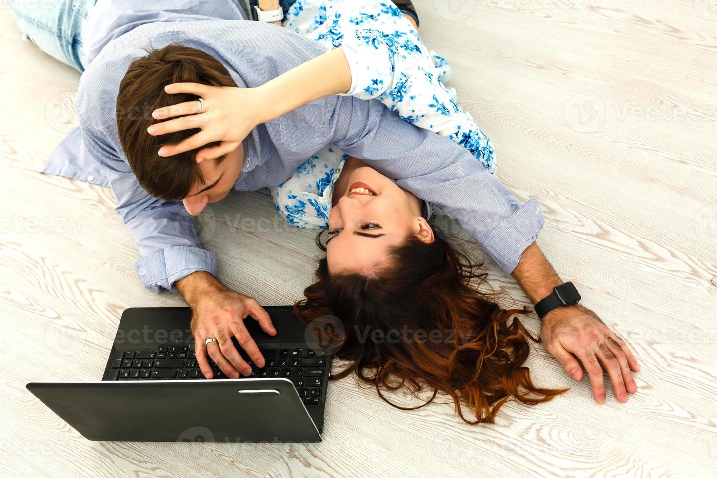 Happy shopping online on laptop at home photo