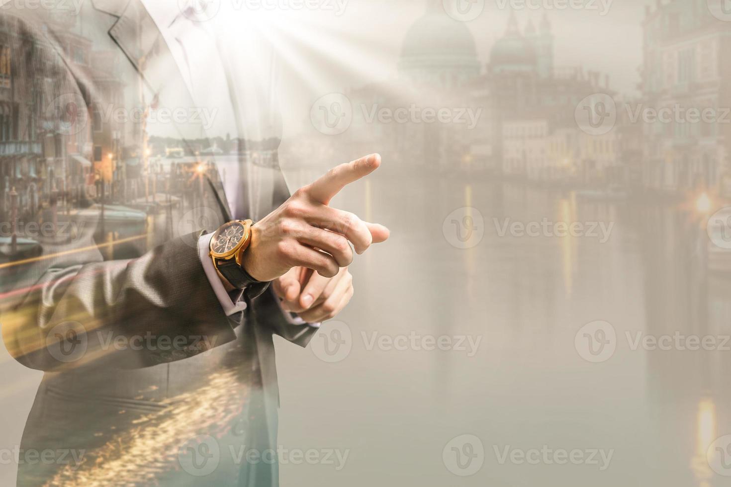 Double exposure of professional businessman touch financial graph and city of business in trading business and technology background photo