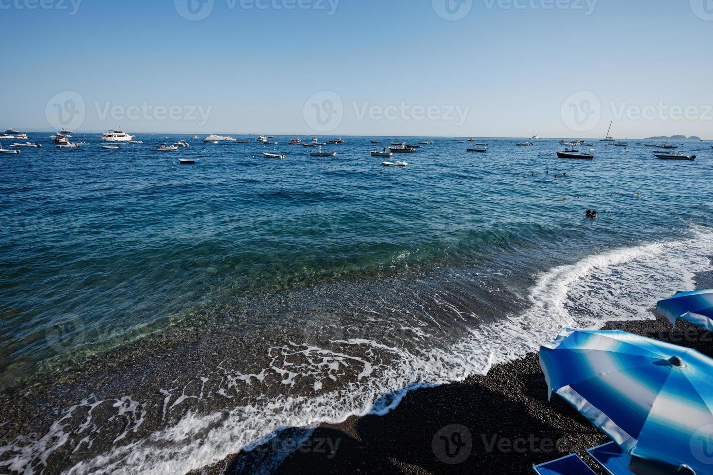 Positano beach at sunny day, Amalfi coast of Italy. photo