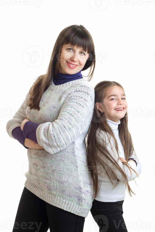 vertical portrait of cheerful mother with her daughter smiling photo