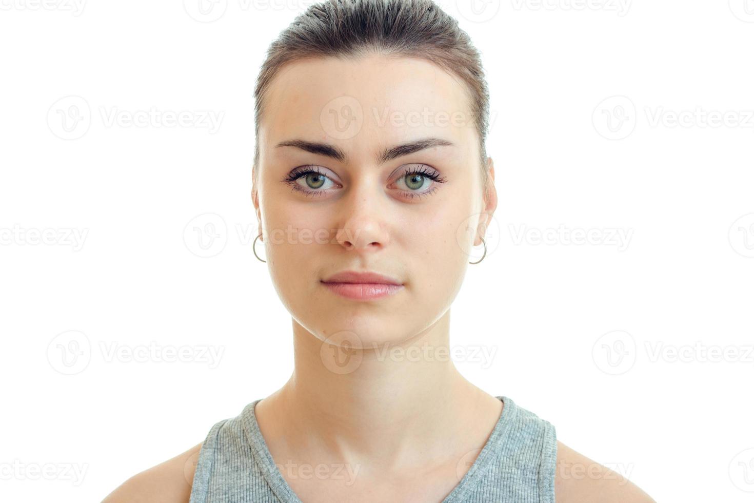 Portrait of a charming girl without makeup that looks right and smiling photo