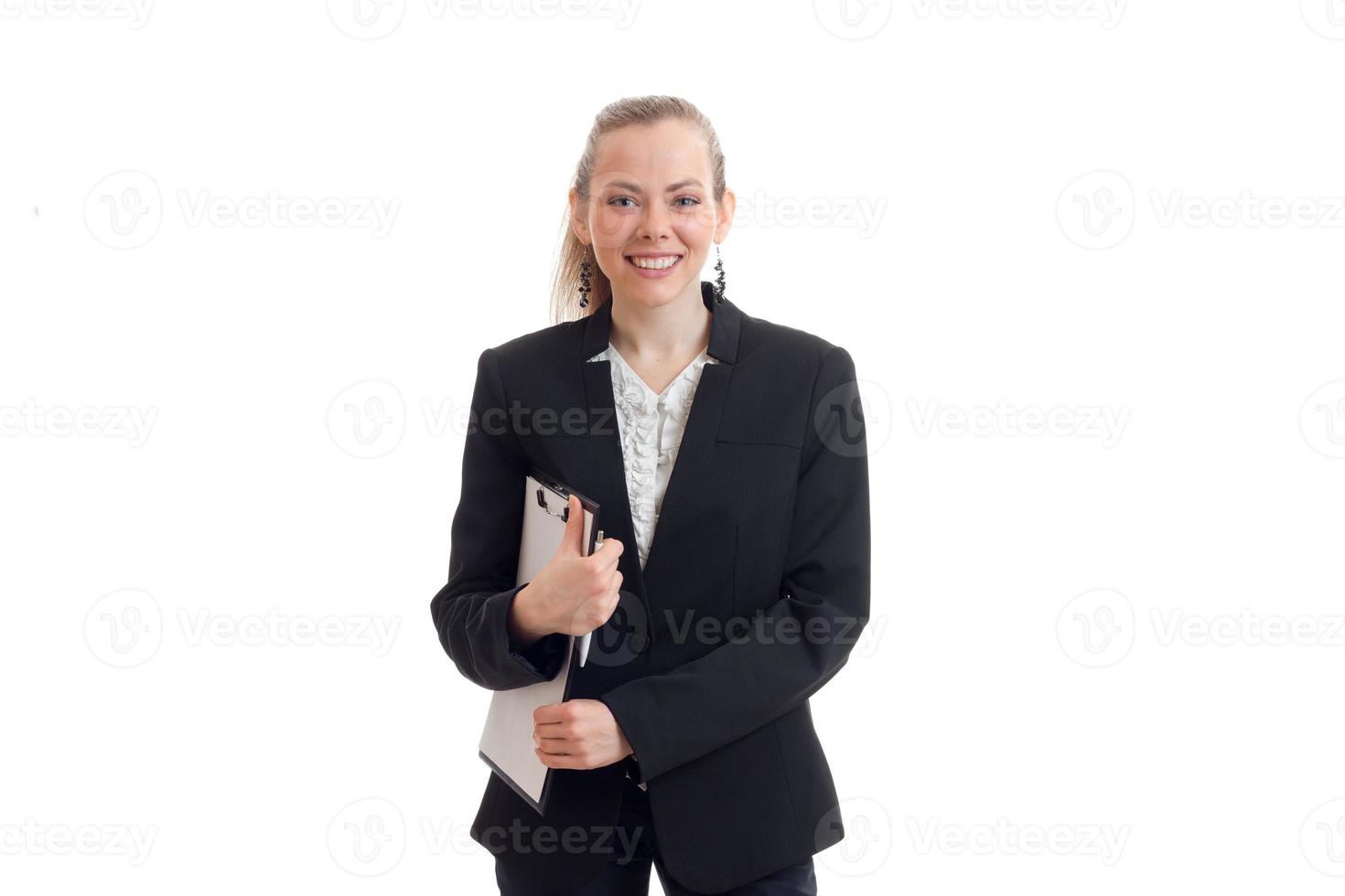 young business woman laughs, looks into the camera and holding a Tablet photo