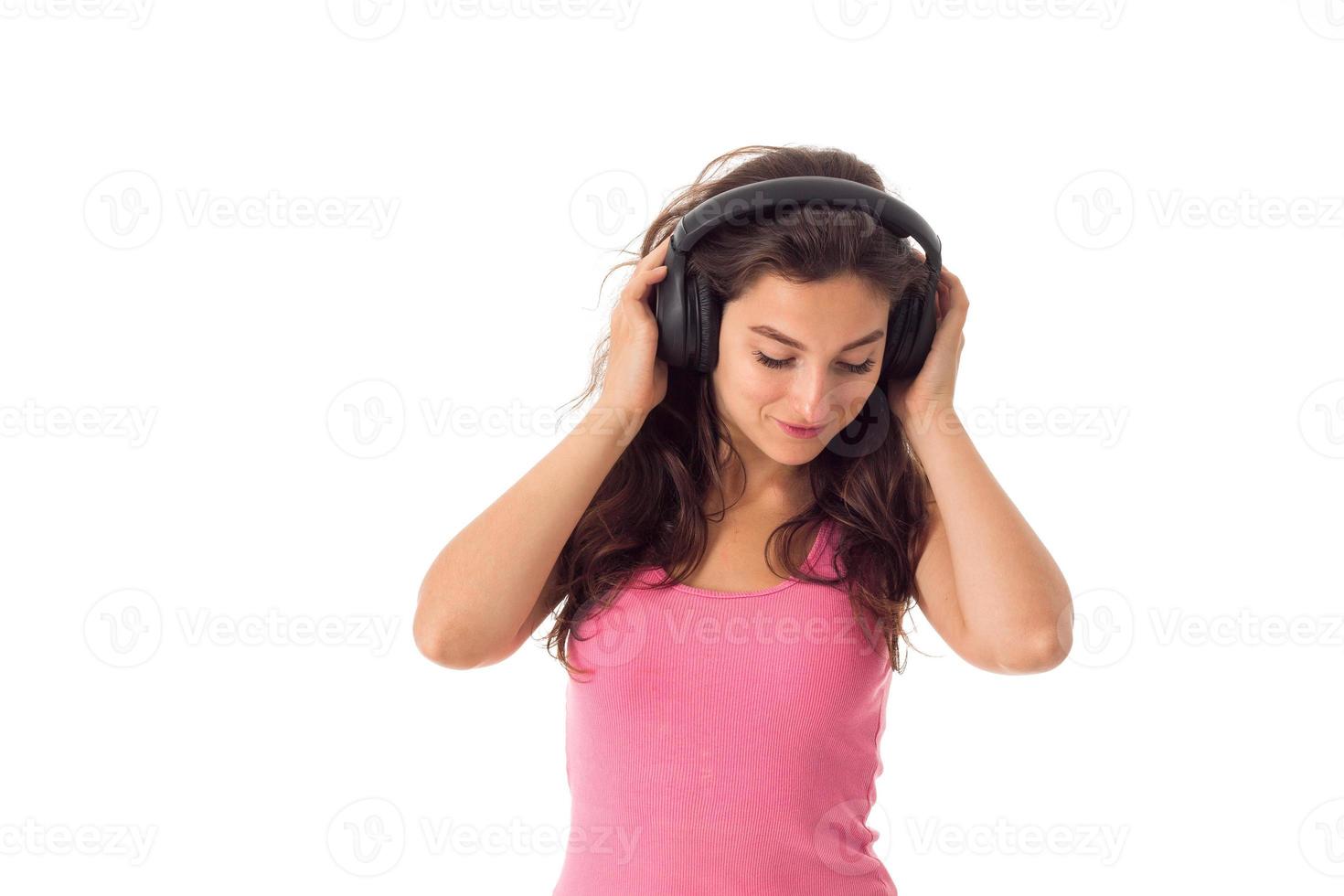 girl in headphones in studio photo