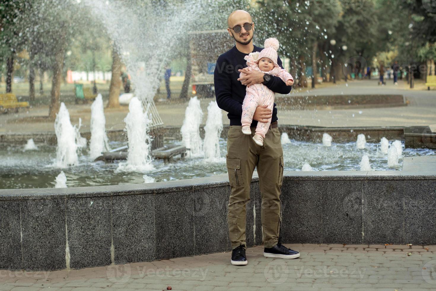 happy father with his little baby girl photo