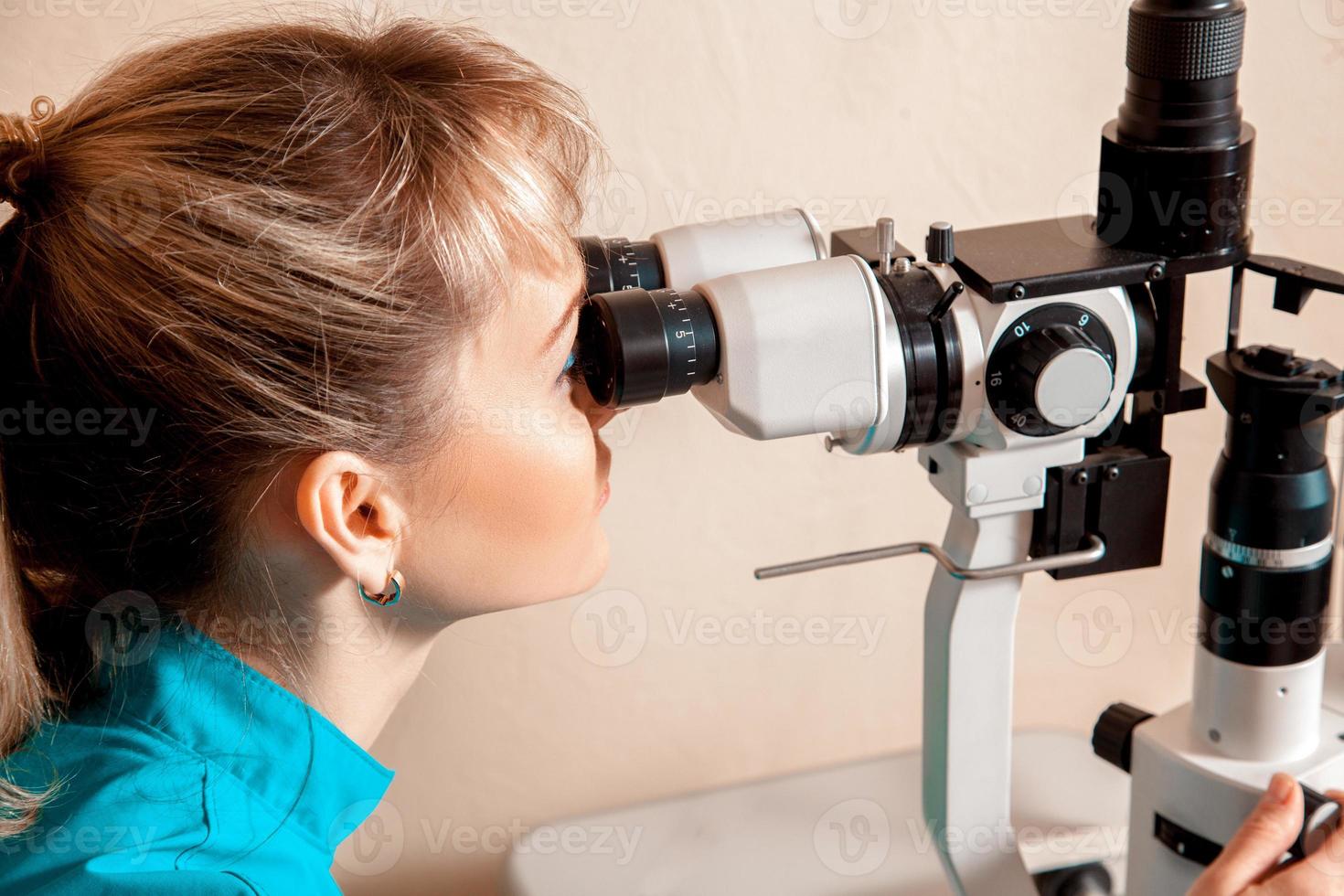 young blond woman ophthalmologist photo